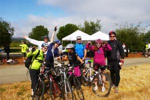 Riders pose in front of an Energize Station on Bike to Work Day 2013 in Contra Costa County, CA